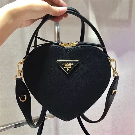 prada black heart shaped bag|prada heart mini pouch.